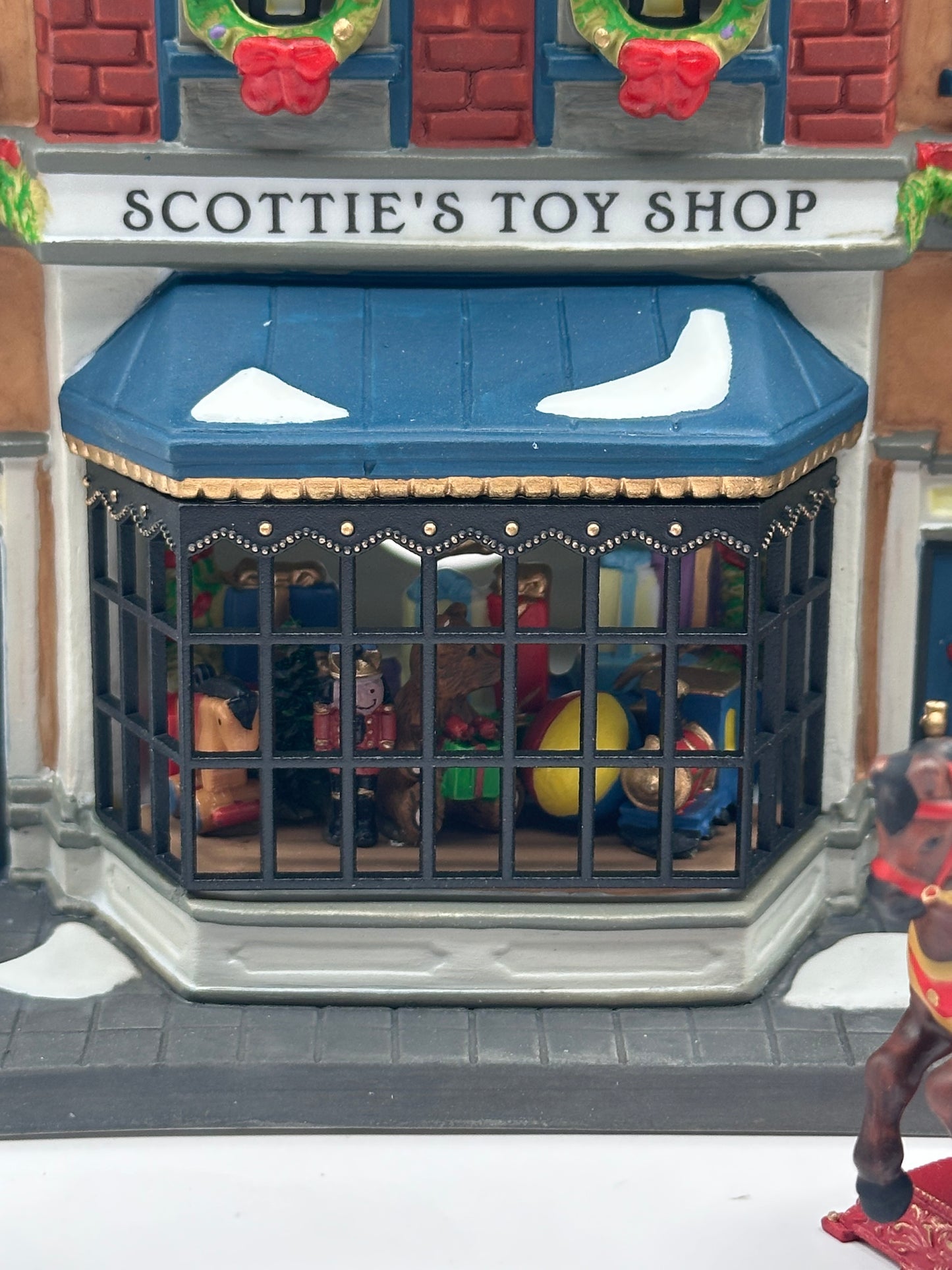 Dept 56 Christmas in the City Scottie’s Toy Shop Gift Set