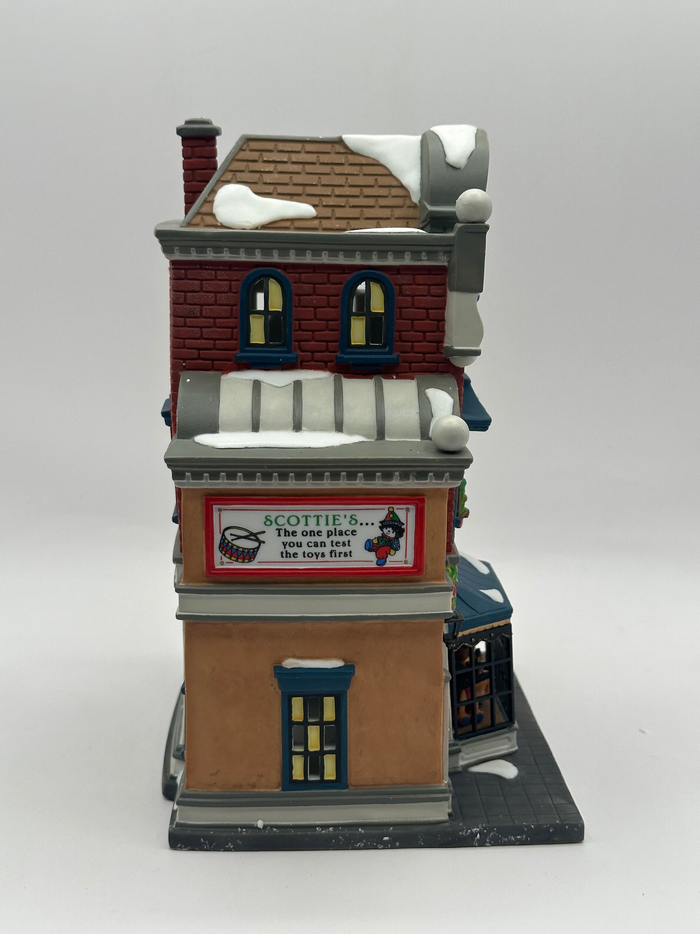 Dept 56 Christmas in the City Scottie’s Toy Shop Gift Set