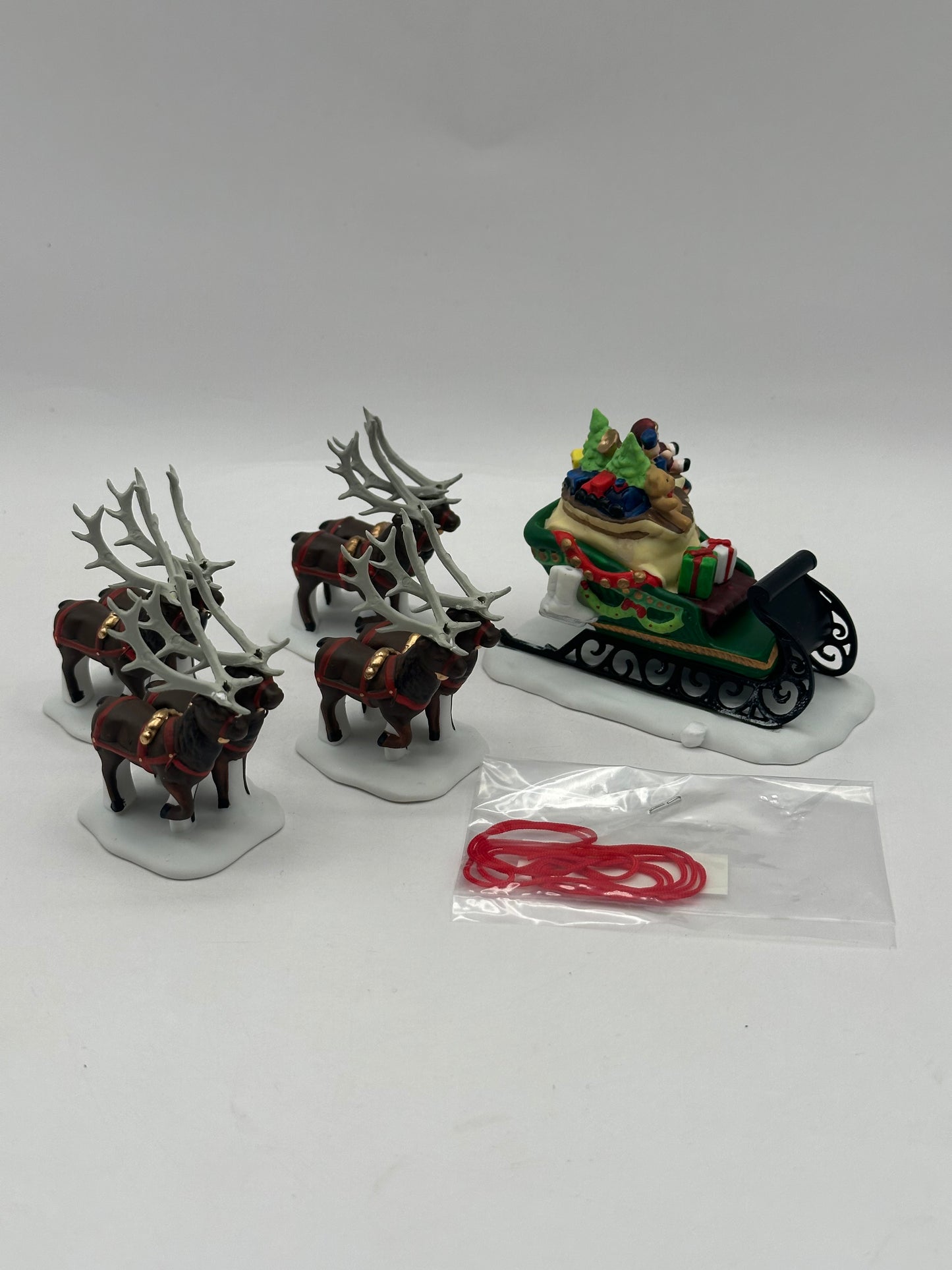 Dept 56 North Pole Sleigh & Eight Tiny Reindeer