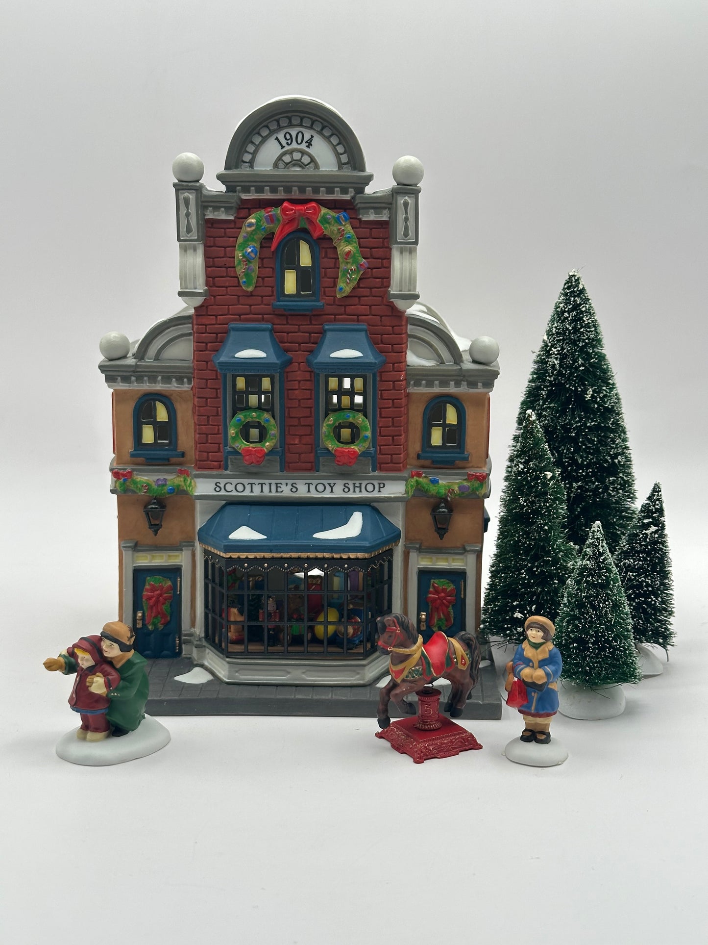 Dept 56 Christmas in the City Scottie’s Toy Shop Gift Set