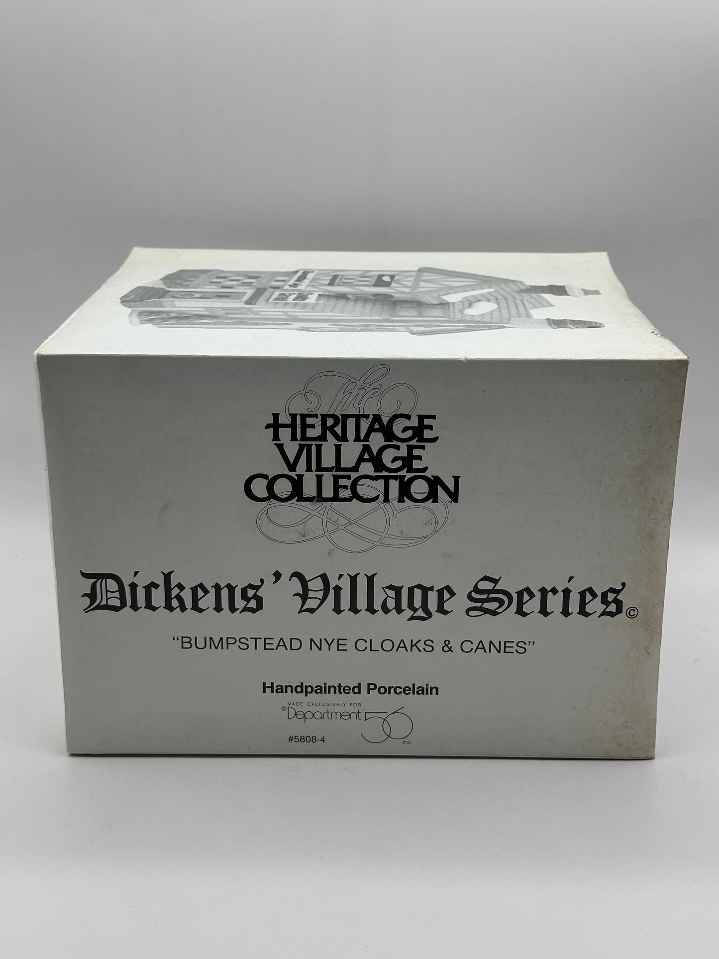 Dept 56 Dickens’ Village Bumpstead Nye Cloaks & Canes