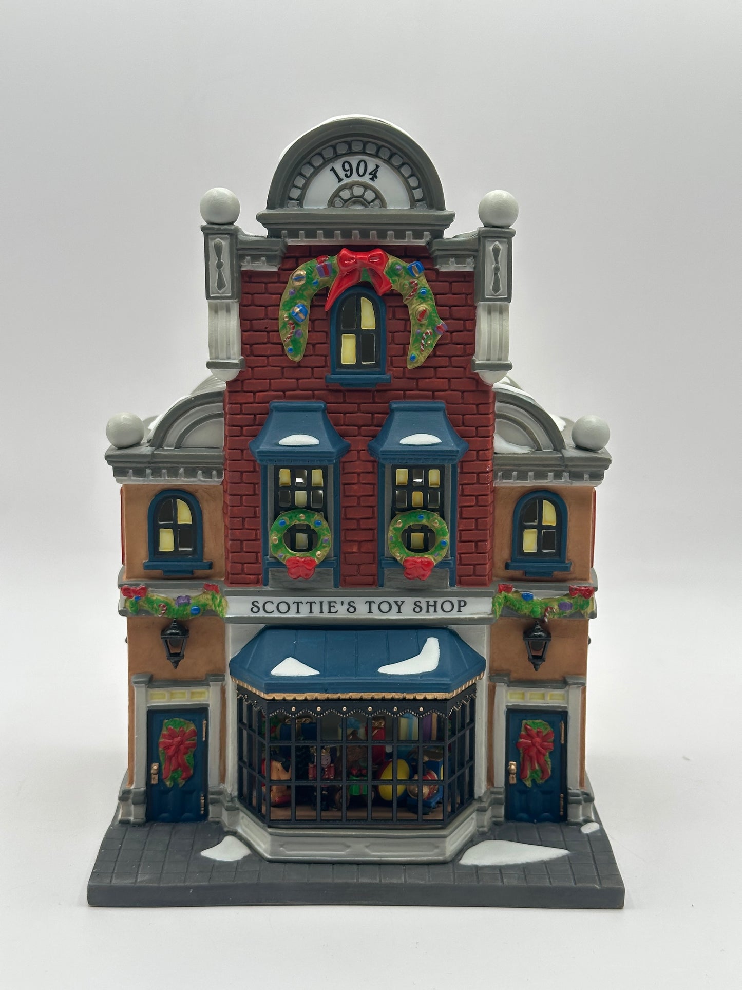 Dept 56 Christmas in the City Scottie’s Toy Shop Gift Set