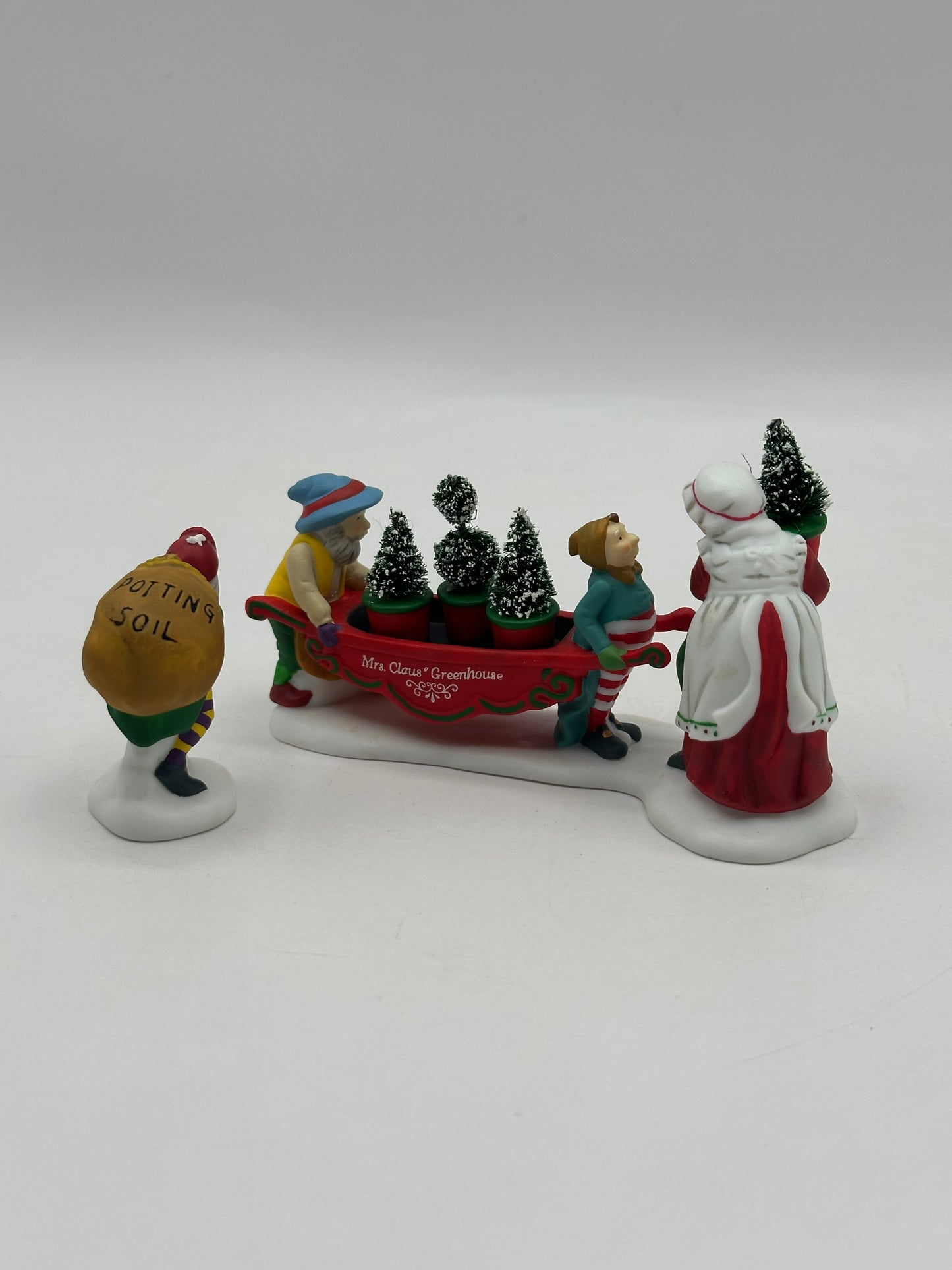 Dept 56 North Pole Series Delivering The Christmas Greens