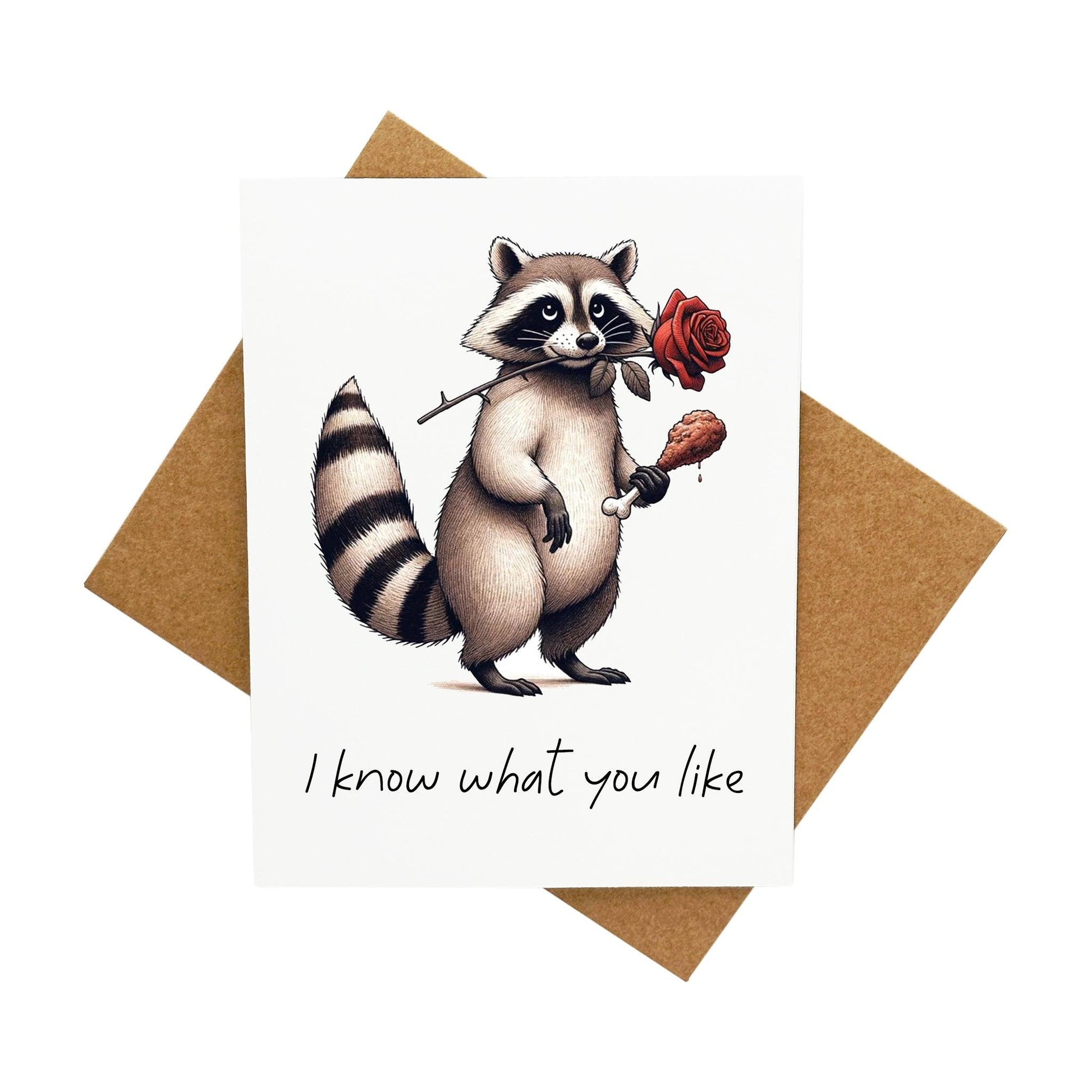 Raccoon Holding A Piece of Chicken and A Rose: A Handcrafted Greeting Card - Vintage Villages