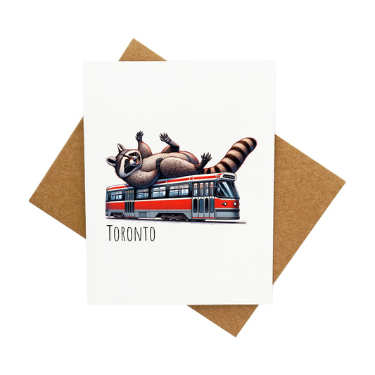 Raccoon Riding TTC Streetcar in Toronto: A Handcrafted Greeting Card - Vintage Villages